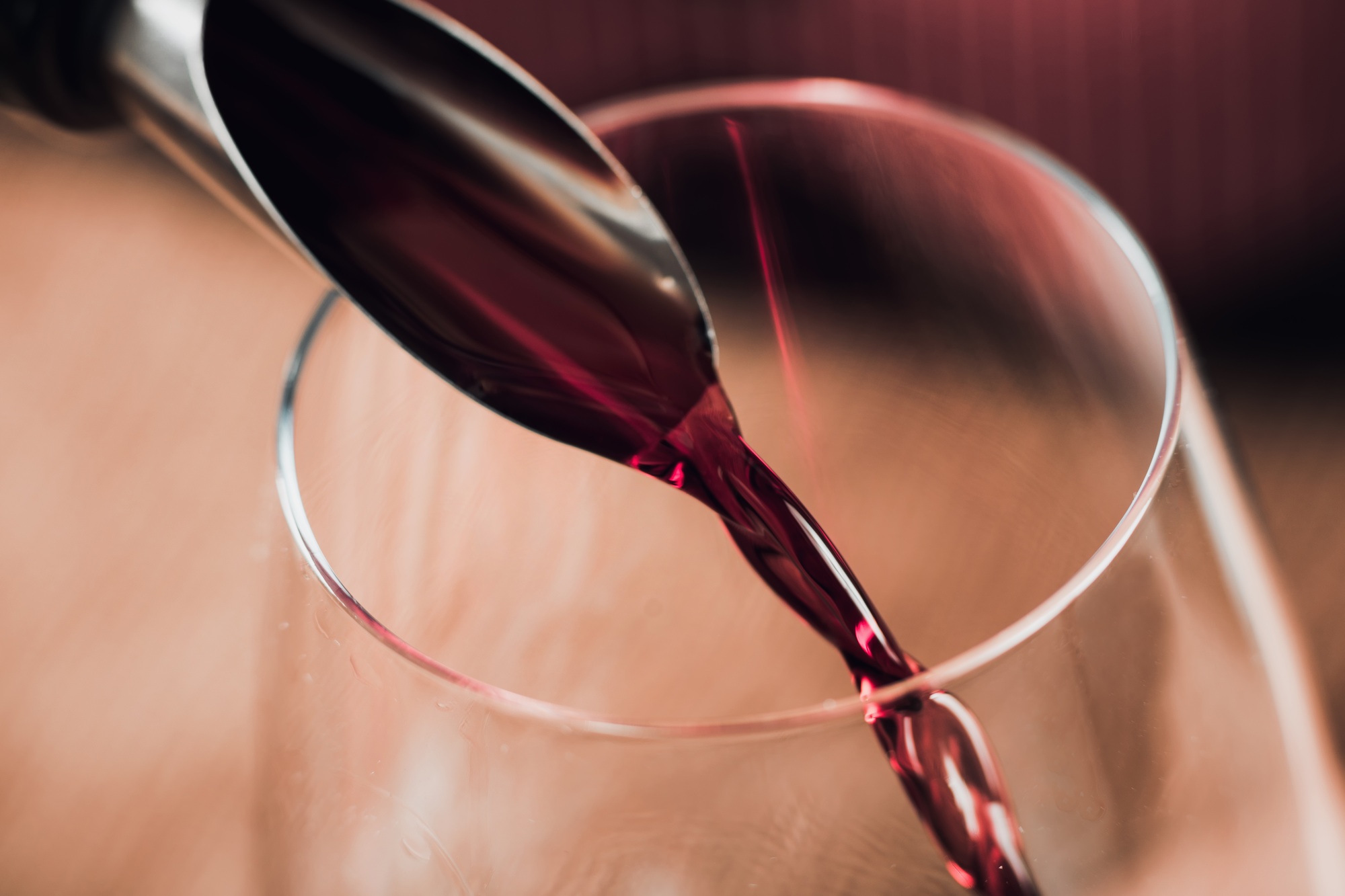 Red Wine Pouring Into Wine Glass - wine tasting barcelona | Play Tour Barcelona